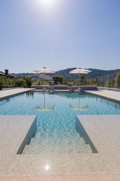 Ramella Graniti A- new swimming pool project with infinity grill, private villa on the hills of Castrocaro (FC)