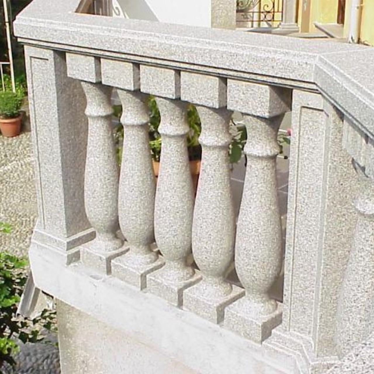 Ramella Graniti Balustrade in bush-hammered and shot sienite