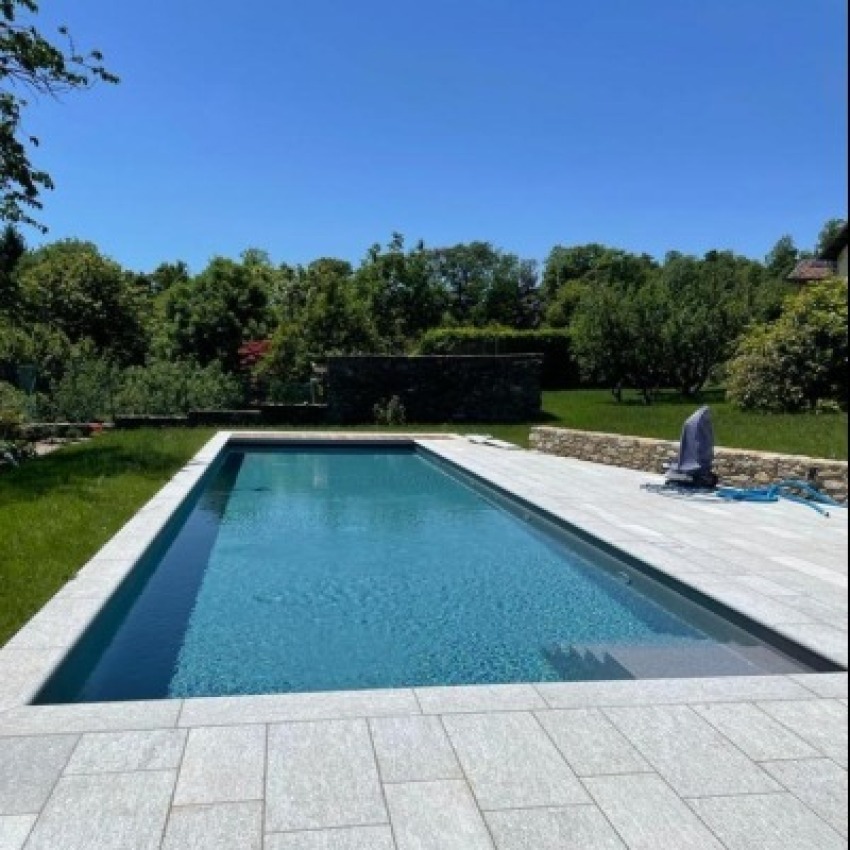 Ramella Graniti Realizations New swimming pool with edge and flooring Luserna, private villa Pollone